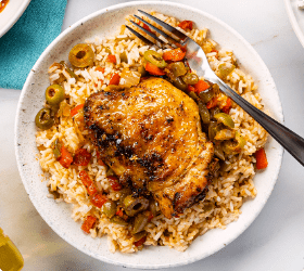 Baked cuban mojo chicken and rice on a plate