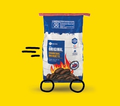 Charcoal bag with doodle circles on the bottom representing wheels, placed on yellow background